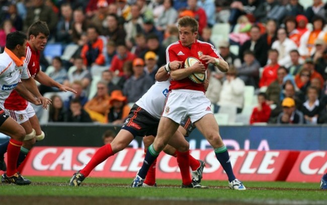 Luke Fitzgerald gets tackled by Adriaan Strauss