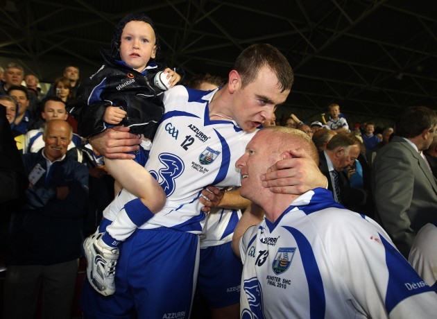 Eoin Kelly and John Mullane celebrate after the game
