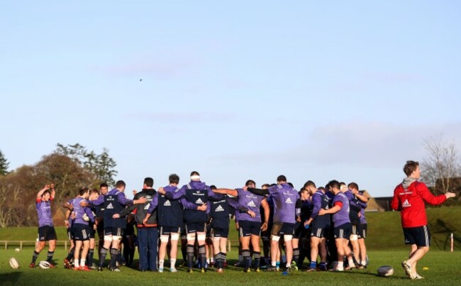 The Munster team huddle