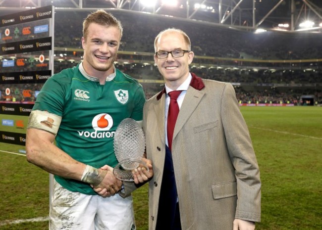 Josh van der Flier presented with the man of the match ward by Mark Sands of Guinness