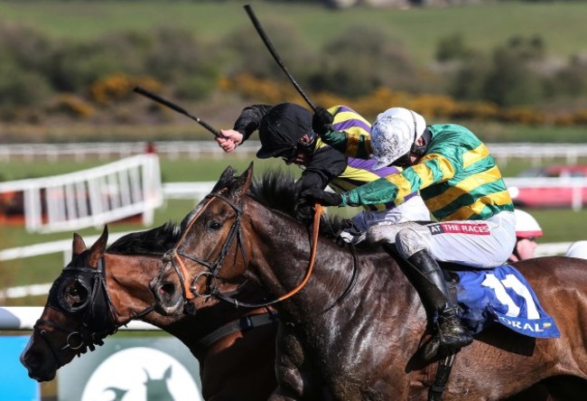 Barry Geraghty on Anibale Fly wins the Coral Handicap Hurdle from Davy Russell on The Romford Pele