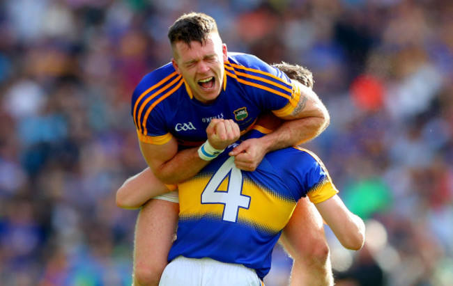 Padraic Maher celebrates after the game with Michael Cahill