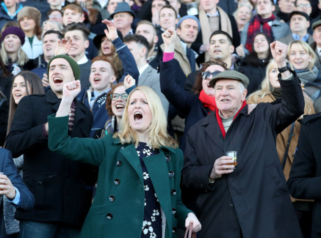 Race goers cheer on during today's races