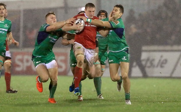 Tommy O'Donnell tackled by Tiernan O'Halloran and Peter Robb