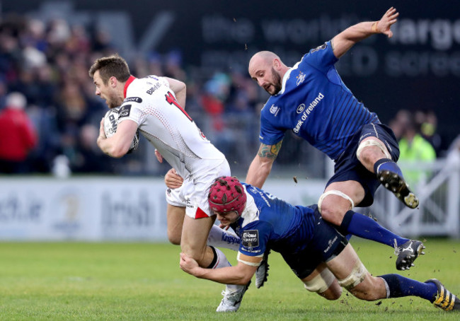 Josh van der Flier and Hayden Triggs tackle Tommy Bowe