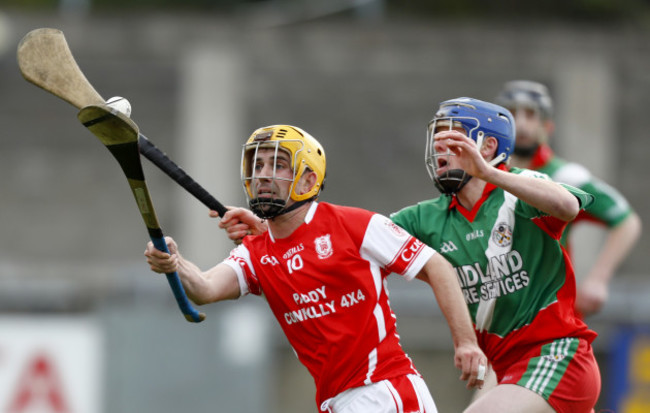 Ciaran Waldron is tackled by Conor Kilbane