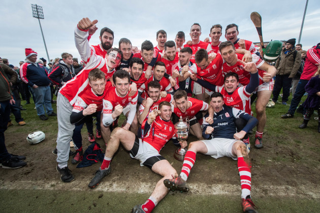 Cuala celebrate with the trophy after the game