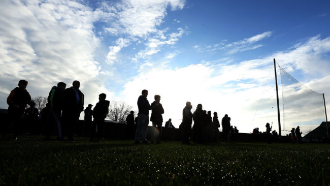 Spectators look on