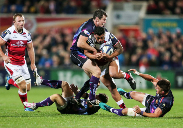 Charles Piutau is tackled by Ian Whitten, Henry Slade and Dave Lewis