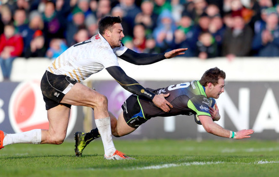 Kieran Marmion scores his sides ninth try despite Lloyd Greeff