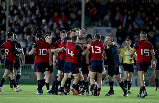 A fight breaks out between both sides during the first half