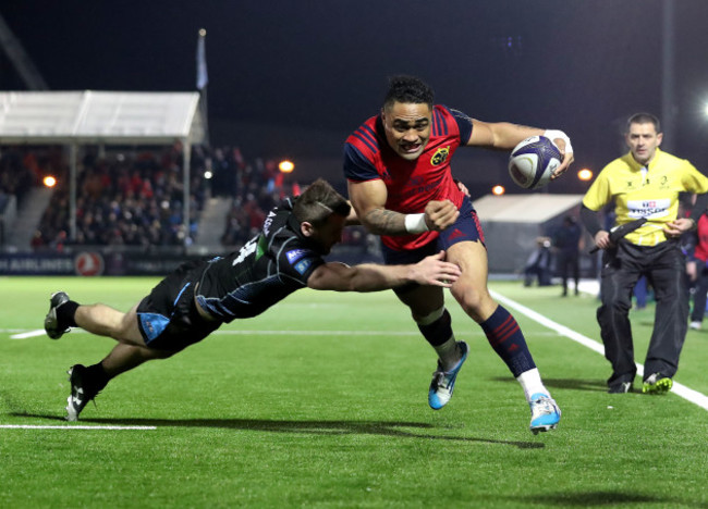 Francis Saili scores a try despite the efforts of Tom Seymour