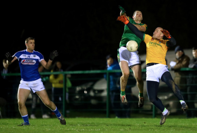 Donie Kingston with Bryan Menton and goalkeeper Joe Sherida