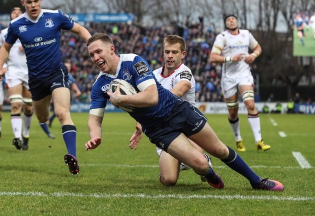 Rory O’Loughlin scores a try despite Paul Marshall