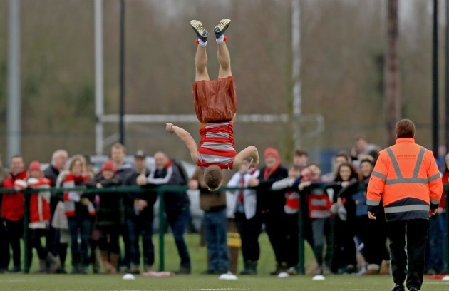 A Glenstal supporter on the pitch at half-time