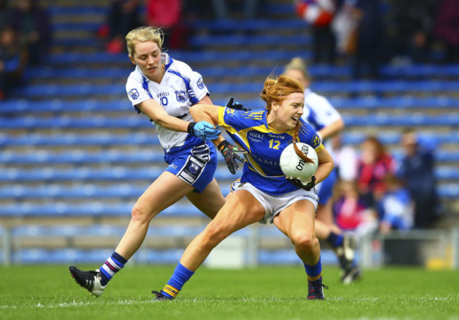 Eimear Myles is tackled by Maria Delahunty