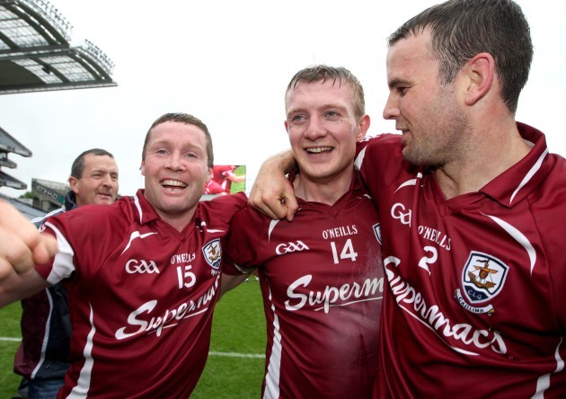 Damien Hayes, Joe Canning and David Collins celebrate  