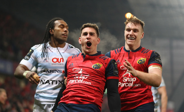 Ian Keatley celebrates scoring a try with Rory Scannell