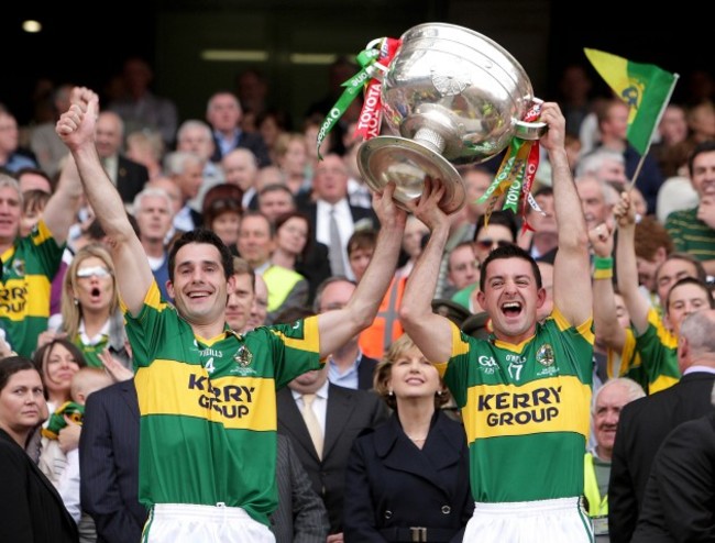 Tom O'Sullivan and Aidan O'Mahony raise the Sam Maguire