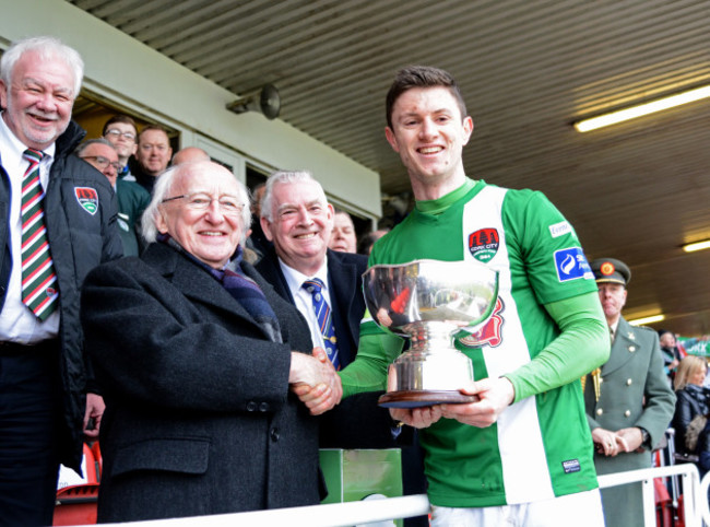 John Dunleavy and Michael D Higgins with the cup