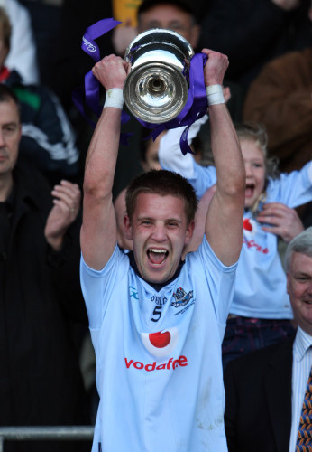 Dublin captain Jonny Cooper lifts the cup