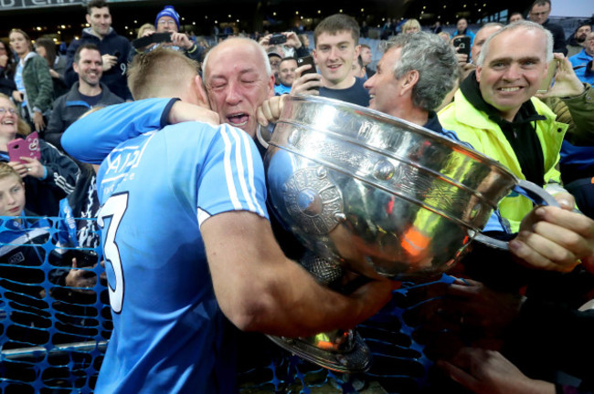 Jonny Cooper celebrates with his father Brendan after the game