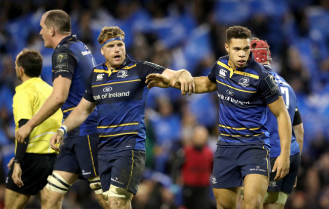 Adam Byrne celebrates scoring their third try with  Jamie Heaslip