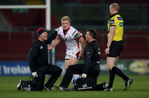Stuart Olding leaves the field after a head injury
