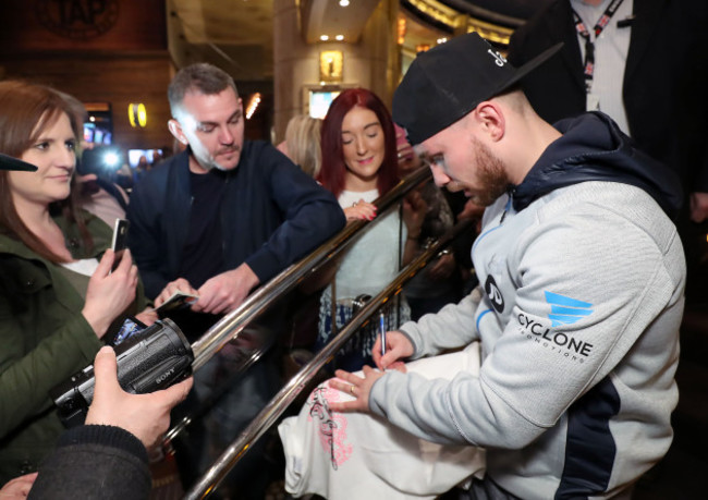 Carl Frampton signs autographs for fans