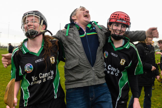 Eglish players celebrate with supporters at the final whistle