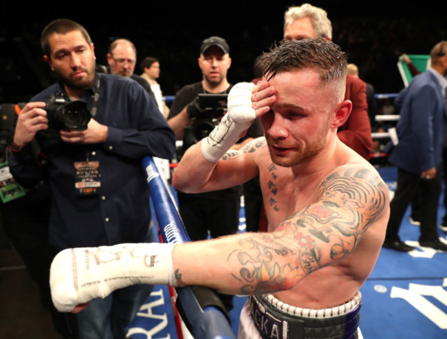 Carl Frampton dejected after losing