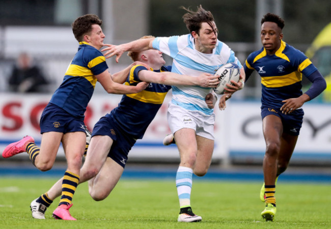 Tom Roche tackled by Ross Hackett