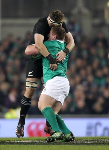 Ireland’s Tadhg Furlong runs into New Zealand All Blacks Kieran Read