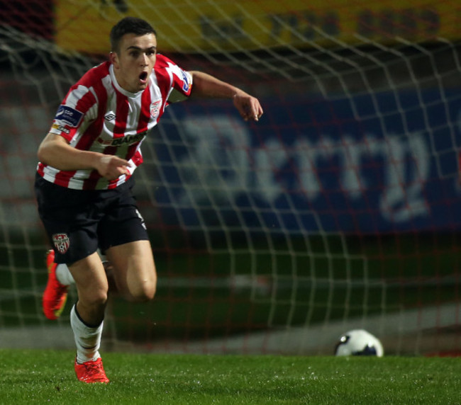 Michael Duffy turns to celebrate scoring the opening goal of the game