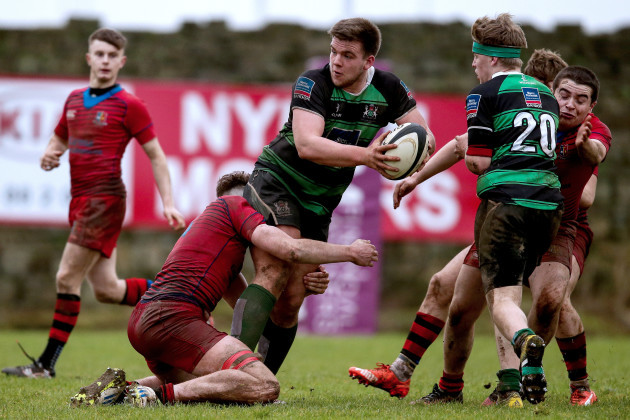 James French is tackled by Paddy Kelly