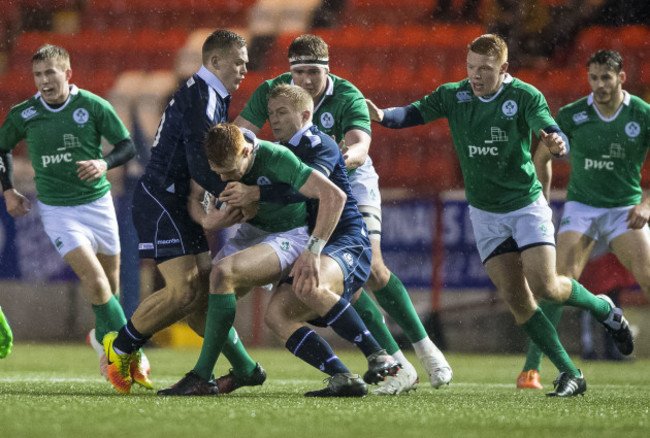 Darcy Graeme and Ross McCann tackle Ciaran Frawley