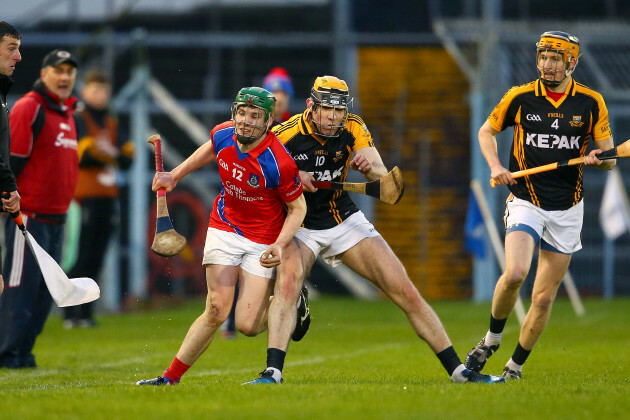 Cathal Doohan is tackled by Conor Cooney