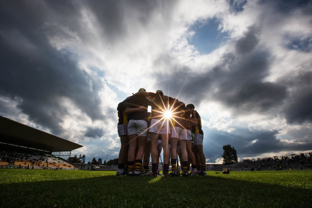 Wexford team huddle before the match