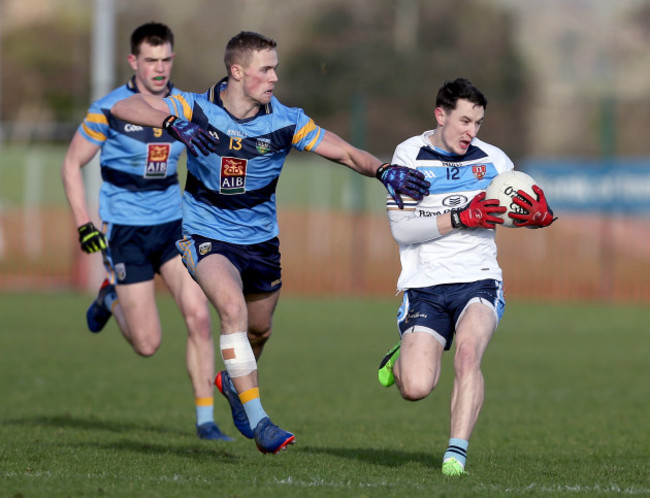 Eoin McHugh with Paul Mannion