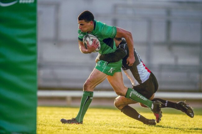 Jordan Conroy on his way to scoring a try