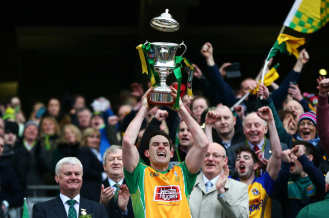 Michael Farragher lifts the cup