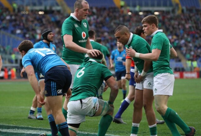 CJ Stander celebrates scoring their fifth try with Devin Toner, Simon Zebo and Garry Ringrose