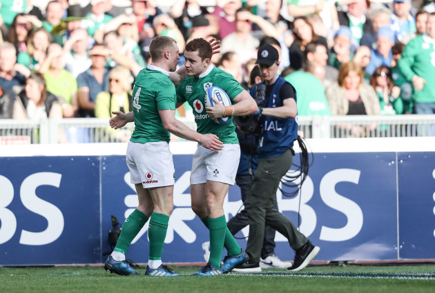 Keith Earls celebrates scoring their third try with Paddy Jackson