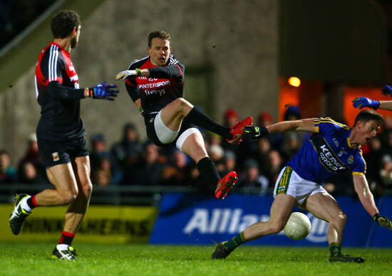 Jonathan Lyne tacklees Andy Moran