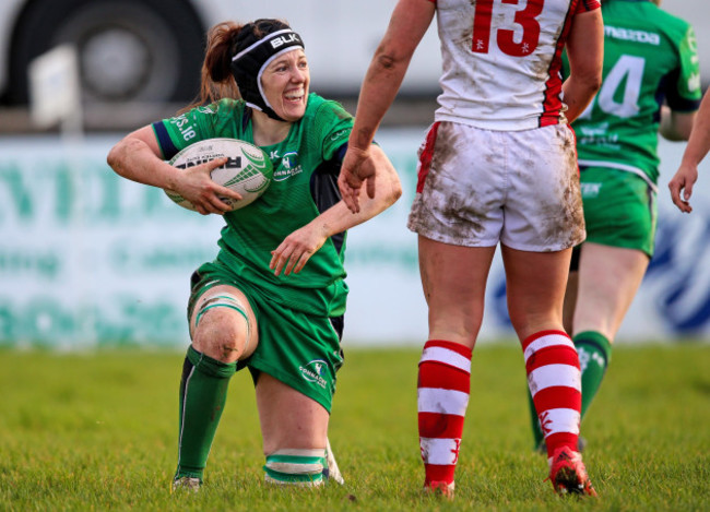 Carol Staunton celebrates scoring a try