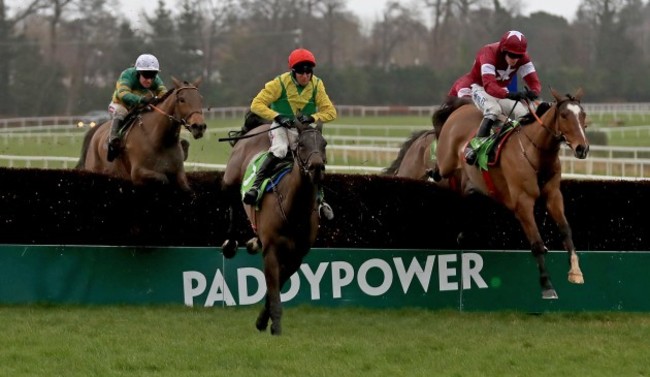 Sizing John and Robbie Power clear the last on the way to winning the race