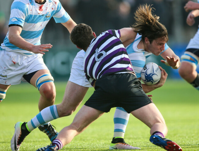 Tom Roche tackled by Jack Cadell