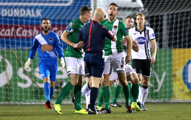 Alan Bennett reacts as referee Tomas Connolly awards Dundalk a free