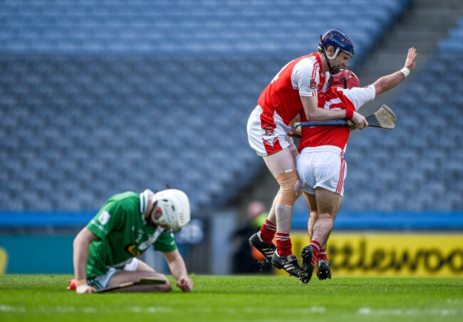 Patrick Duggan celebrates with Shane Kelly after scoring a goal