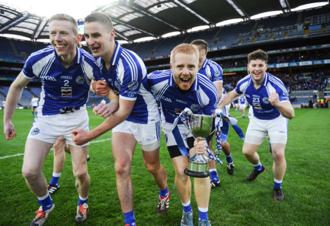 Padraig Doyle and his team celebrate with the cup